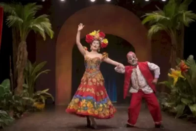 Portada artística que fusiona elementos del teatro latinoamericano con bailarines de tango